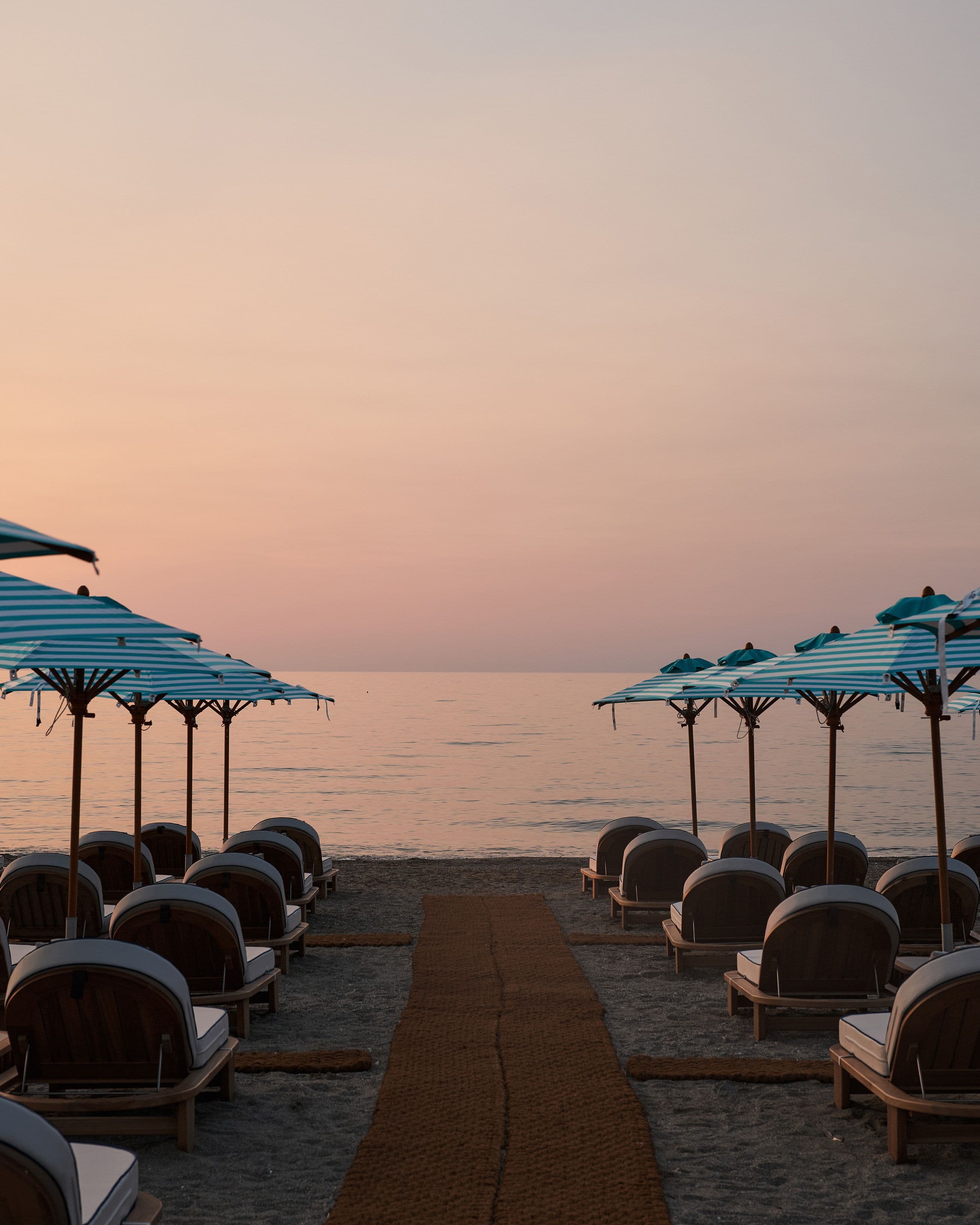 Sunset view over Uzenie All-Suites, an adults-only resort by the sea in Crete